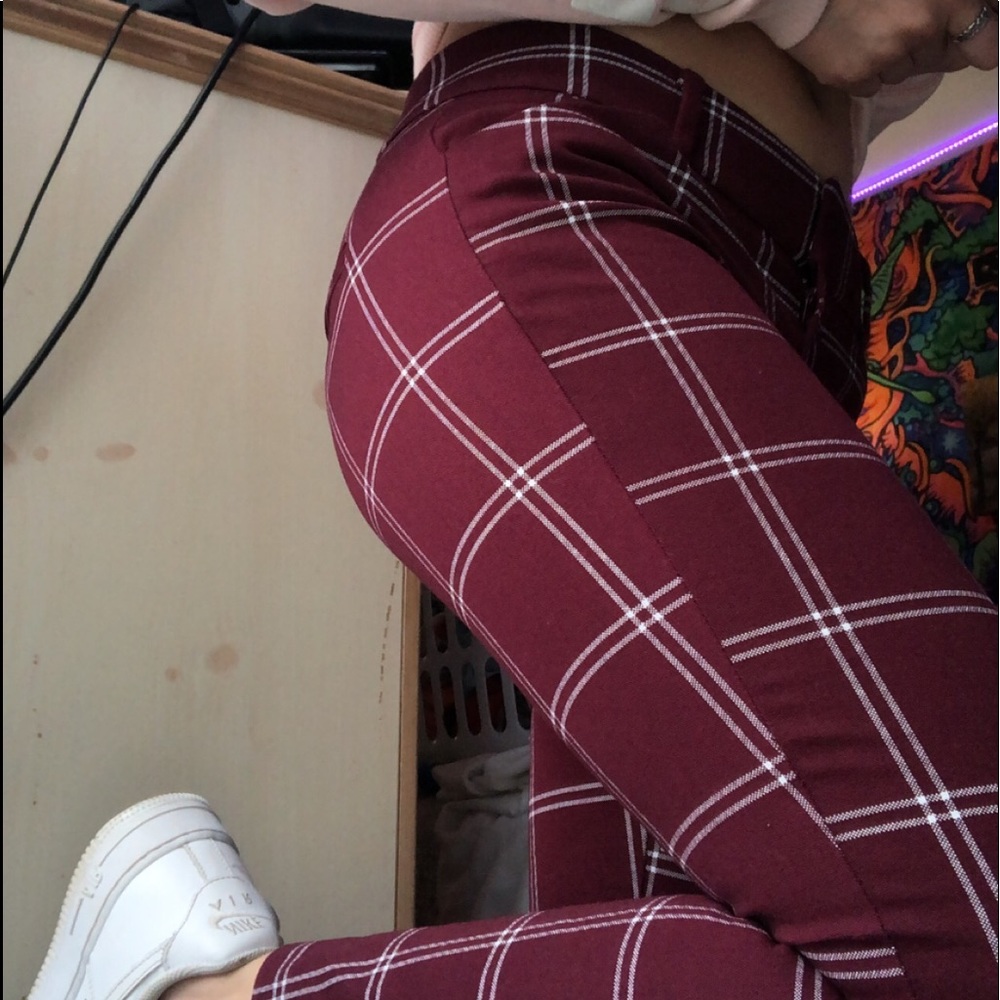 Plaid burgundy pants.